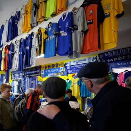 Fans looking at past Everton shirts in the memorabilia sale upstairs in St Luke’s Church that is held before every home game