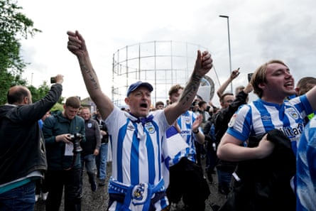 Huddersfield Town fans show their support before the playoff semi-final against Luton.