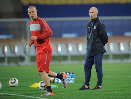 Bob Bradley looks on as Michael Bradley trains during the USA training session at the Royal Bafokeng Stadium on June 11, 2010 in Rustenburg, South Africa.