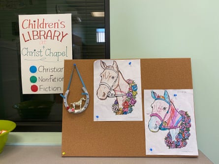 Pictures of horses colored by children inside a children’s library at the Christ chapel on the Backside of Churchill Downs.