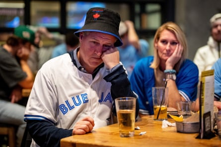 Blue Jays fans contemplate defeat after Game 7.