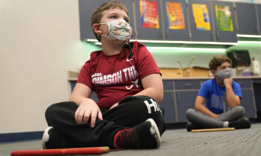 Third graders listen during a music class in Murphy, Texas, in December 2020.