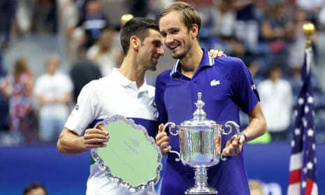 Novak Djokovic (left) congratulates Daniil Medvedev after his victory in the men’s singles final. 