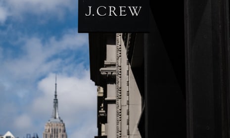 A J Crew sign outside a branch of the fashion retailer on 5th Avenue in New York.