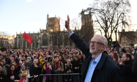 Jeremy Corbyn waves to supporters after speaking at a rally outside Bristol City Council in Bristol.