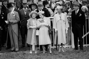 1988: The Queen, the Queen Mother and Princess Anne study the form guide before the Derby