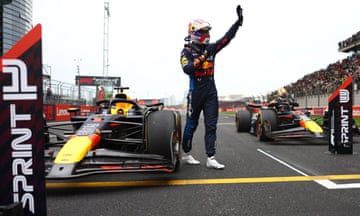 Max Verstappen of Oracle Red Bull Racing waves to the crowd at the Formula One sprint ahead of the Chinese Grand Prix at Shanghai International Circuit