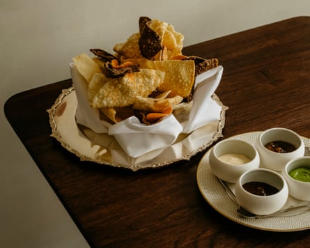 Oudh’s poppadom selection with chutneys.