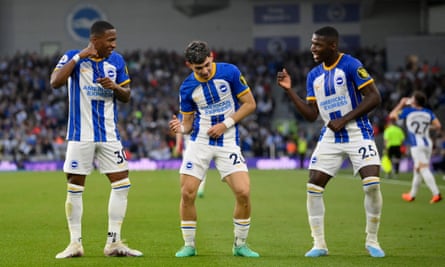 Brighton & Hove Albion's Julio Enciso celebrates scoring their archetypal  extremity   against Manchester City with teammates Pervis Estupinan (left) and Moises Caicedo.