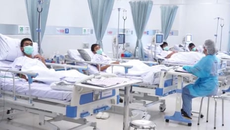 First footage of rescued Thai boys in hospital – video