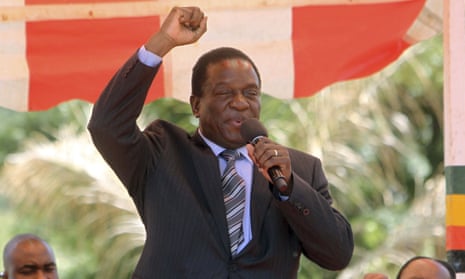 Emmerson Mnangagwa greets party supporters at the ZANU-PF headquarters in Harare