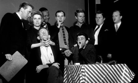 The cast of That Was the Week That Was, 1963, with Kenneth Cope, standing fourth left with striped tie.