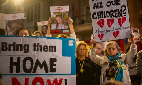 The relatives of those kidnapped on 7 October demonstrate outside Unicef headquarters in Tel Aviv.