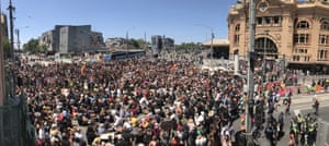 Protesters gather at Flinders Street Station in Melbourne