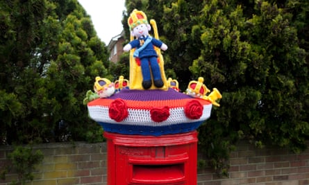 A post box is topped with a knitted King Charles III top in Castle Point.