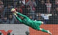 Atletico's keeper Jan Oblak makes his second save during the penalty shoot-out of the Champions League last 16 second leg against Inter.