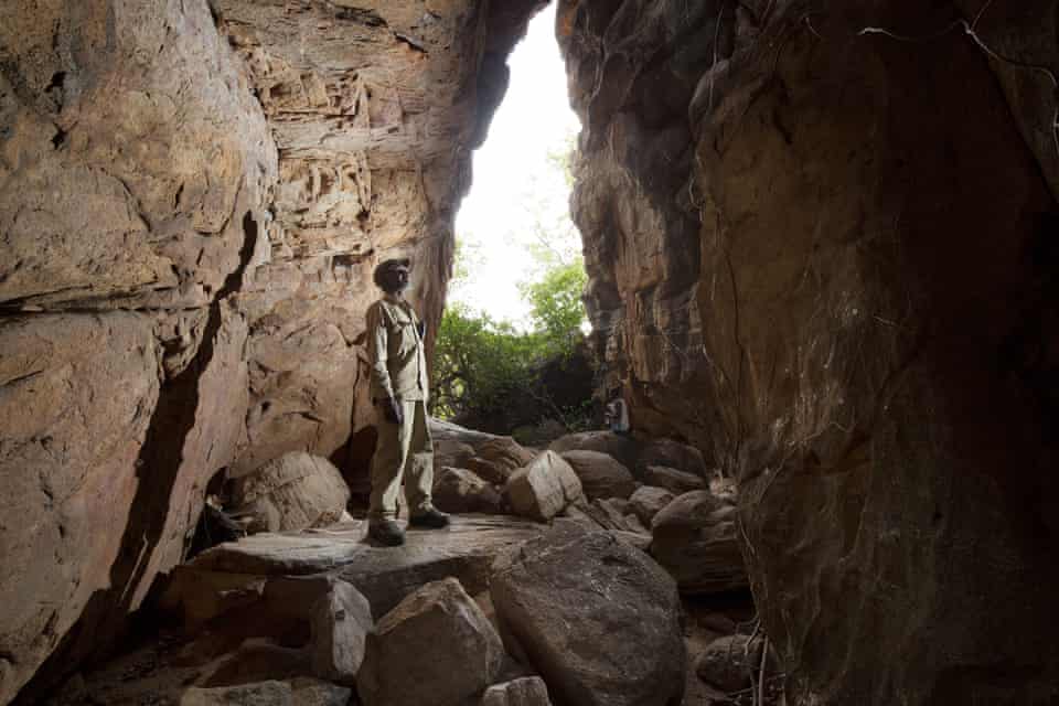 Traditional owner Ricky Nabarlambarl, and other Bininj, search for rock art in remote cave systems on the Arnhem Land plateau.