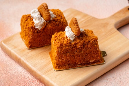 Sponge cakes sitting connected a woody chopping board