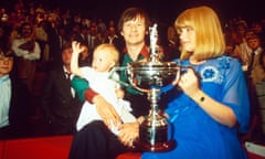 Alex Higgins, his wife Lynn, and their daughter Lauren, celebrate at the end of the 1982 World Snooker final.