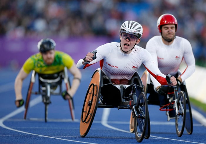 Nathan Maguire celebrates after crossing the line first ahead of England's Daniel Sidbury.