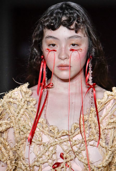 Whimsical … a model with bows on her face at Simone Rocha’s show in February 2023.