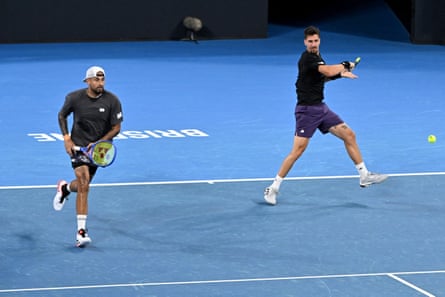 Thanasi Kokkinakis plays a changeable during his men's doubles lucifer pinch Nick Kyrgios against Matthew Ebden and Rajeev Ram.