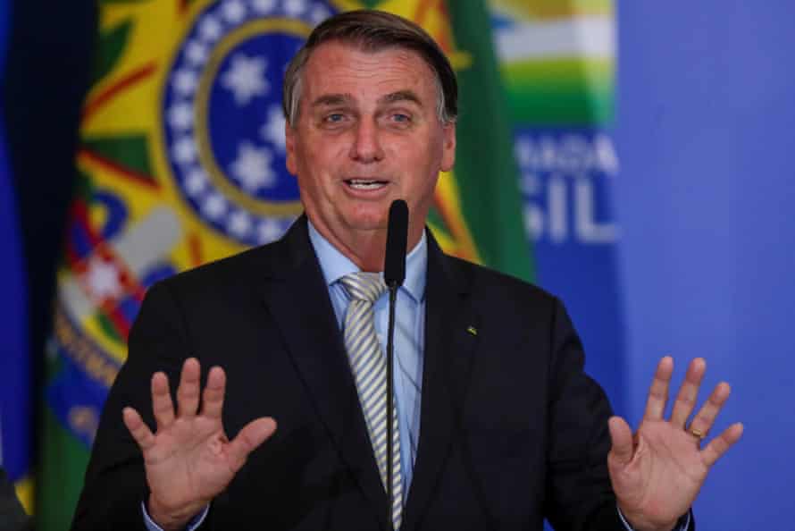 Brazil’s president Jair Bolsonaro gestures during a ceremony at the Planalto Palace in Brasilia, Brazil on 24 February, 2021.