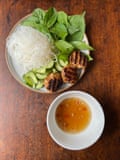 Luke Nguyen adds garlic, chives and spring onion to his bun cha.