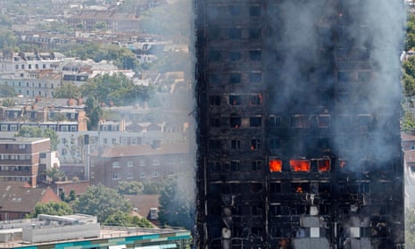 Flames and smoke engulf Grenfell Tower in west London