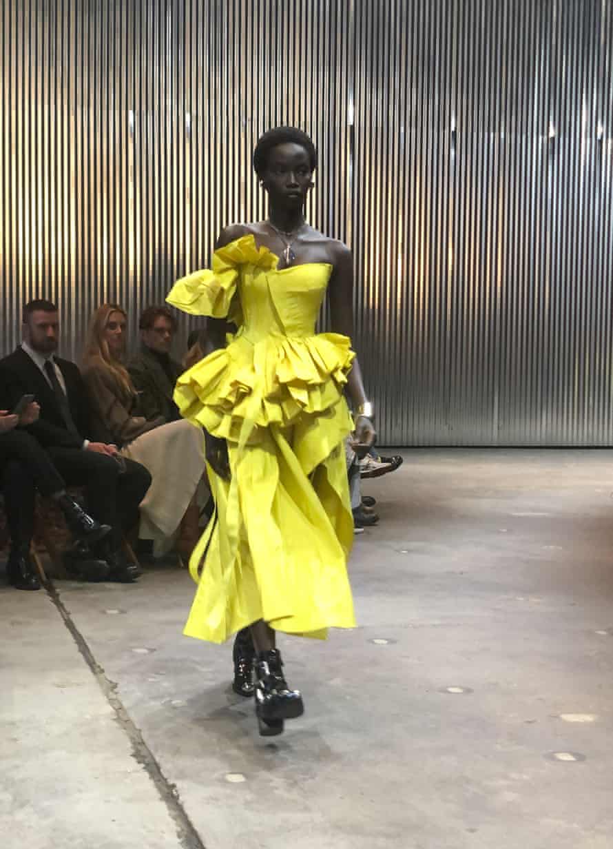 A model walks the runway wearing fashion from the Alexander McQueen autumn/winter 2022 collection in New York