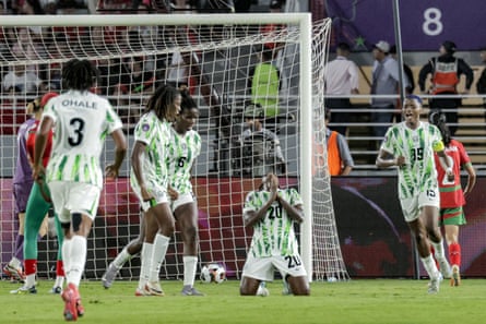 Folashade Florence Ijamilusi celebrates after scoring for Nigeria in the final