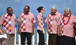 The leaders of Papua New Guinea, Vanuatu, New Zealand, Fiji and Samoa talk before the group photo at the Pacific Island Forum.