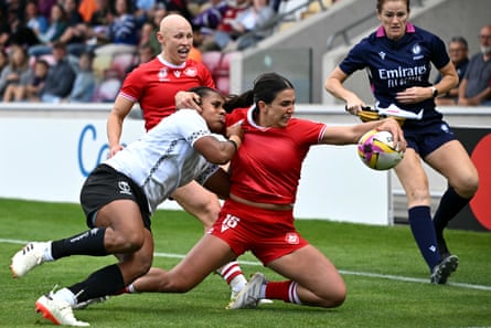 Canada’s Julia Schell scores a try against Fiji.