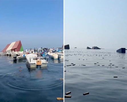 Capsized boats and sunken containers float amid debris after a cargo ship sank off Oman
