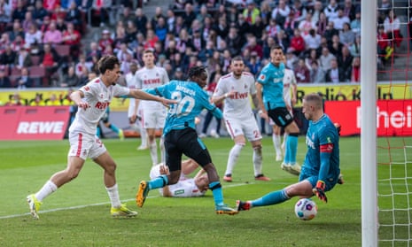 Jeremie Frimpong scores Bayer Leverkusen’s first goal against Köln.