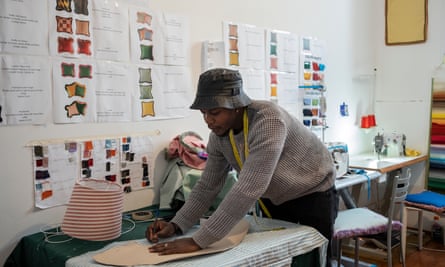 Designer Paboy Bojang, who makes ruffled towels.