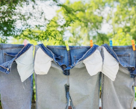 Washed jeans hang on a clothes line
