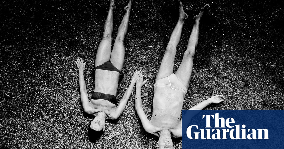‘One simple gesture says it all’: the world in black and white – in pictures