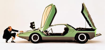 Nuccio Bertone admires the 1968 Alfa Romeo Carabo concept car designed by Marcello Gandini.