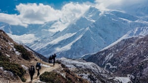 Trekkers slowly meandered along the picturesque Annapurna circuit, Annapurna, Central Nepal