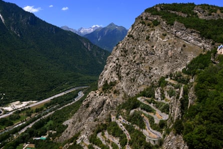 The peloton climbing the spectacular switchbacks of Lacets de Montvernier during stage 11 before the biggest climbs of the day