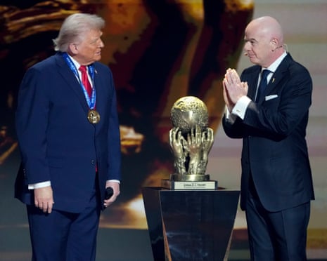 Gianni Infantino (right) awards the first Fifa peace prize to Donald Trump last December.