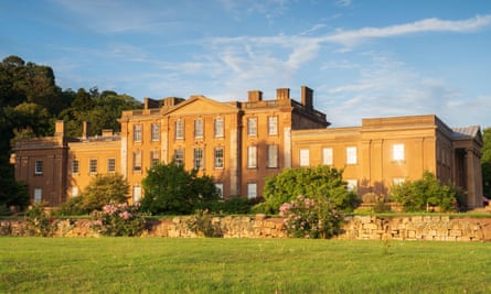 Himley Hall with the last light of the day shining on the building.