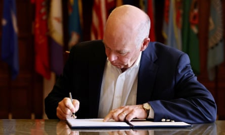 Greg Gianforte signs a law banning TikTok in the state on Wednesday.
