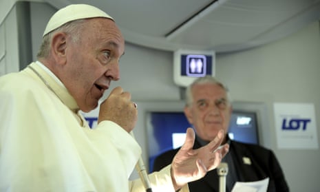 Pope Francis speaks to journalists on board the flight from Kraków, Poland, to Rome, at the end of his 5-day trip to southern Poland, Sunday, July 31, 2016. Francis announced that the next World Youth Day will take place in Panama in 2019. (Filippo Monteforte/Pool Photo via AP)