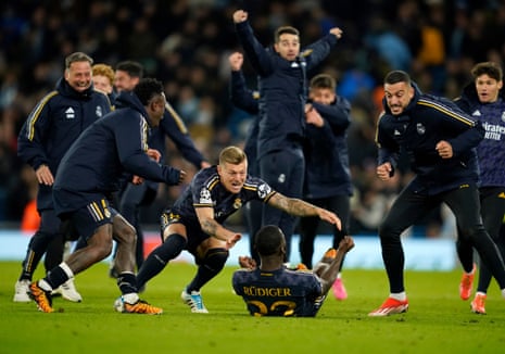 Real Madrid’s Antonio Rudiger celebrates victory with teammates after wining the Champions League quarter-final second leg at Manchester City.