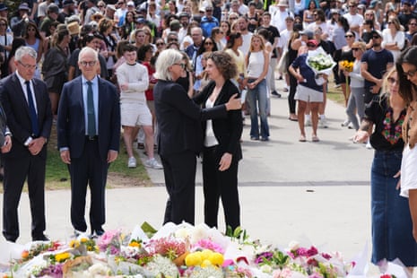 Allegra Spender (r) with the governor general, Sam Mostyn, at yesterday’s vigil at Bondi Pavillion.