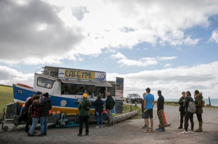 Customers await their orders at Jonathan William’s seaweed truck Cafe Môr in Freshwater West, Pembrokeshire