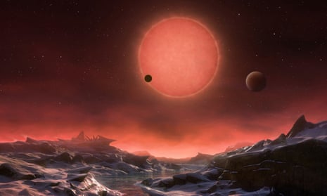 This artist’s impression shows an imagined view from the surface one of the three planets. These worlds have sizes and temperatures similar to those of Venus and Earth and are the best targets found so far for the search for life outside the solar system.