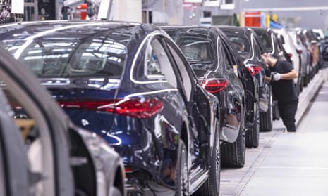 Cars on an assembly line at a Mercedes-Benz manufacturing plant in Sindelfingen, Germany